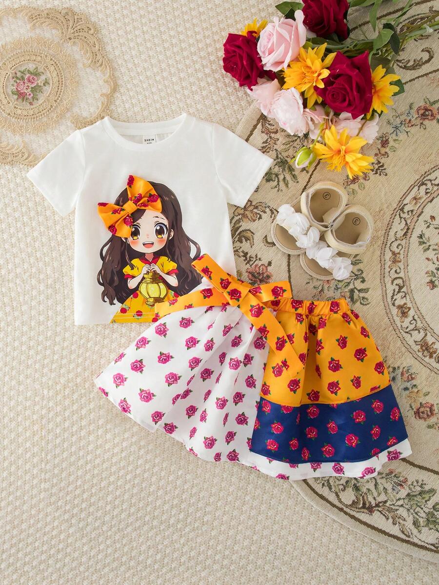 SHEIN Conjunto de 2 piezas de blusa de manga corta y falda con estampado floral lindo para niñas - Azul - Ver 1