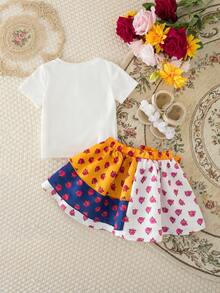 SHEIN Conjunto de 2 piezas de blusa de manga corta y falda con estampado floral lindo para niñas - Azul - Ver 2