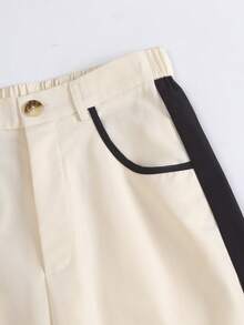 这款极简撞色慵懒垂坠休闲裤采用高腰阔腿设计，巧妙遮掩赘肉，拉长身形，是通勤和休闲穿着的理想之选。垂坠面料不易起皱，是懒人必备，轻松打造纤长美腿的视觉效果。