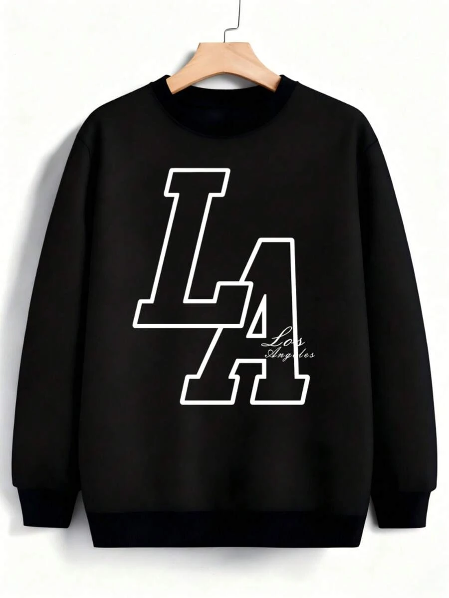 Hombre004 Sudadera de cuello redondo de moda Parte superior de ropa para casa, cómoda y abrigada cálida para otoño e invierno, con envío local desde México Camisa negra con el distintivo "LA" que refleja un estilo atemporal y elegante, perfecta para cualquier ocasión casual - Negro - Ver 1