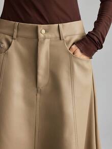 Ontre 2026春夏新款休闲时尚卡其色A字皮裙，柔软舒适的皮革材质，适合商务、通勤、日常穿着，适宜温度5-15℃，也适合情人节、派对、婚礼、办公室等场合，简约优雅的都市时尚风格，纯色设计更显身材。 - 卡其色 - 查看 8