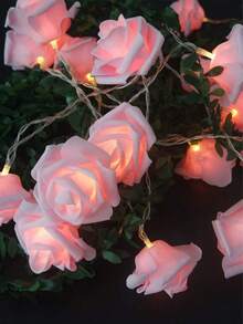 新款LED玫瑰花串灯，仿真电池灯，婚礼房装饰灯，商场情人节氛围灯。