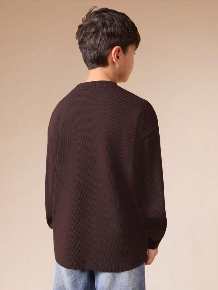 버튼 플래킷이 달린 와플 니트 긴팔 헨리 탑