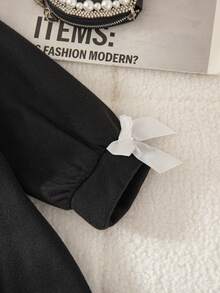 1件女童冬季新款2025韩版中长款外套，圆领开襟宽松长袖，可拆卸蝴蝶结袖口和领子，优雅时尚街头风简约风衣 - 黑色 - 查看 6