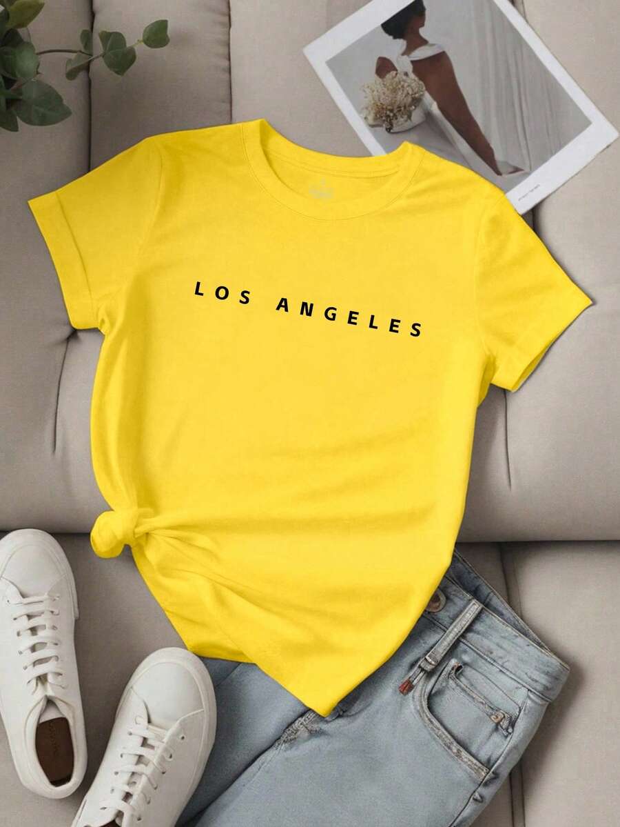 EMERY ROSE Camiseta casual de manga corta con estampado de lema y gráfico de LOS ANGELES para mujer - Amarillo - Ver 1