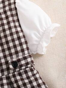 Elladie kids 这款女童复古法式优雅可爱格子碎花长袖连衣裙，长度及膝，适合女孩夏季穿着，出席家庭聚会、派对和玩耍等场合。连衣裙的设计让女孩看起来活力四射、可爱迷人，更添几分青春气息。穿上它，女孩在与家人共度时光时，定能充满乐趣和活力！ - 棕色 - 查看 6