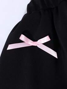 SHEIN Sparklyn 少女时尚优雅T恤套装，白色针织上衣搭配黑色编织蛋糕裙，上衣饰有黑色蝴蝶结，裙子点缀串珠。 - 粉色 - 查看 6