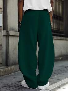 Manfinity EMRG Pantalones de chándal casuales para hombres de unicolor con cordón en la cintura y bajo curvo - Verde Oscuro - Ver 2