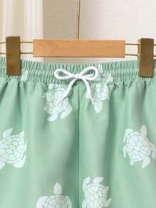 Calções de praia/natação para meninos pré-adolescentes com estampa de tartaruga marinha verde e cordão na cintura, ideais para férias, praia, litoral, verão, férias de primavera e verão. - Multicolorido - Ver 4