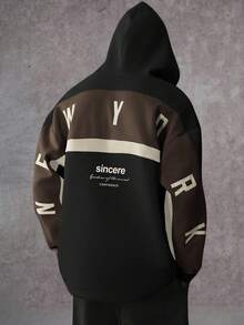 STYNVO Sudadera con capucha casual de moda para hombres, con estampado de letras y contraste de colores, hombros caídos, suelta y forrada térmicamente, para otoño/invierno, sudadera con gráficos de moda urbana - Negro - Ver 3