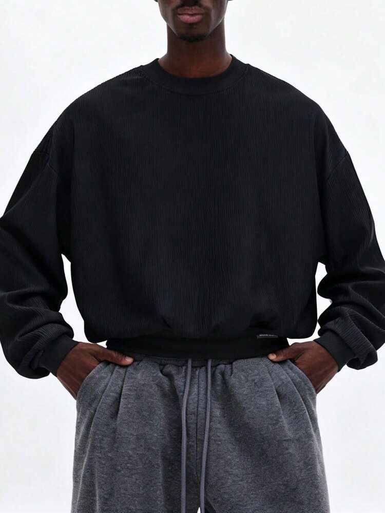 Sweat-shirt noir à col rond