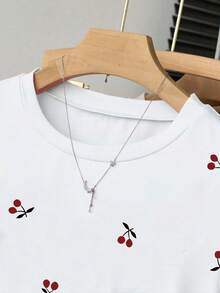 SHEIN Bộ 2 áo thun nữ kẻ sọc cắt ngắn nhún bèo, hàng mới về mùa hè, thiết kế họa tiết, màu trắng, xanh navy, mặc ngoài trời, cạp chun, họa tiết quả anh đào ngọt ngào, bộ combo thanh lịch - Nhiều màu - Xem 4