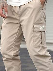 Pantalones de trabajo casuales para hombre, con corte ajustado, múltiples bolsillos y cintura con cordón ajustable. - Caqui - Ver 4