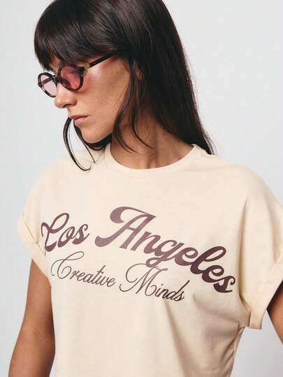 SURIMA Camiseta holgada de manga corta, cuello redondo y corta para mujer, de estilo minimalista y casual en color albaricoque