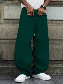 Manfinity EMRG Pantalones de chándal casuales para hombres de unicolor con cordón en la cintura y bajo curvo - Verde Oscuro - Ver 3