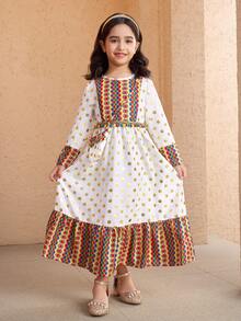 SHEIN Young Girls' Dress, Featuring Beige Base Fabric With Golden Polka Dots, Colorful Geometric Floral Panels On Bodice, Hem And Cuffs, Decorated With Colorful Tassels At Waist, Matching Printed Pouch, Suitable For Festivals And Cultural Events, Lightweight Fabric For Spring/Summer/Autumn