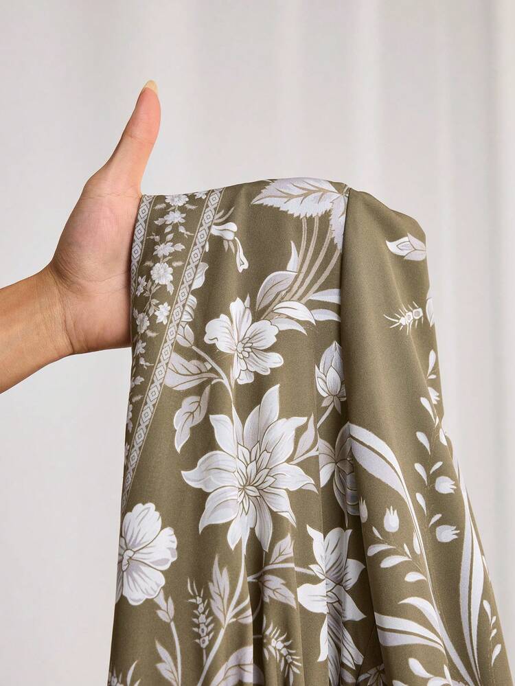 This Elegant Women's Dress Features A Floral Pattern On An Olive Green Base, Adorned With White Floral Designs, Exuding A Retro And Sophisticated Yet Fresh Style. The V-Neck Wrap-Style Design With A Belted Waist And Puff Sleeves Flatters The Figure While Maintaining An Elegant Feel. The Sophisticated Olive Green Color Is Suitable For Layering In Autumn And Winter Or Wearing Alone In Spring And Summer. Suitable For Both Spring And Autumn, It Can Be Accessorized With Jewelry To Brighten The Festive Atmosphere During The New Year. Perfect For Young People's Gatherings And Casual Occasions, This Dress Showcases Fashionable Taste At Small Gatherings With Its Retro Floral Pattern, And Is Also Easily Versatile For Work Or As An Outer Layer. It's A Versatile Piece In Your New Year's Wardrobe That Combines Quality And Style.