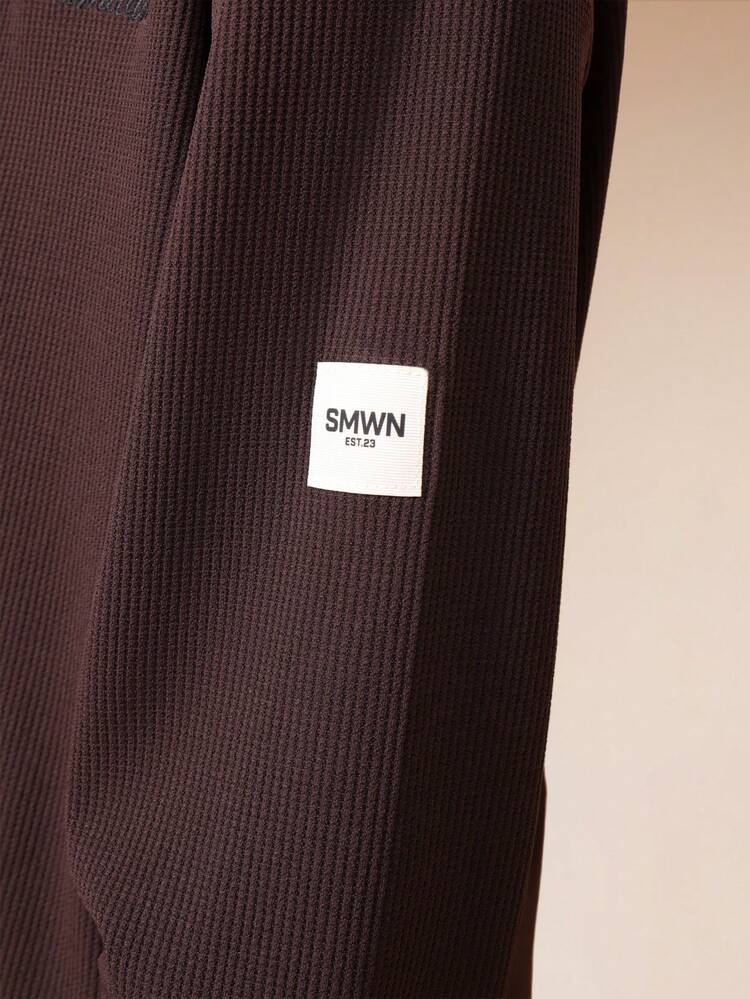 버튼 플래킷이 달린 와플 니트 긴팔 헨리 탑