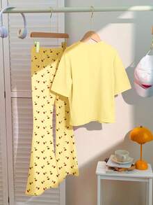 Bộ 2 món áo thun cổ tròn tay ngắn dáng rộng thoải mái và quần ống loe ôm sát, màu vàng kem, thời trang retro, phù hợp với mọi mùa - trắng - Xem 2