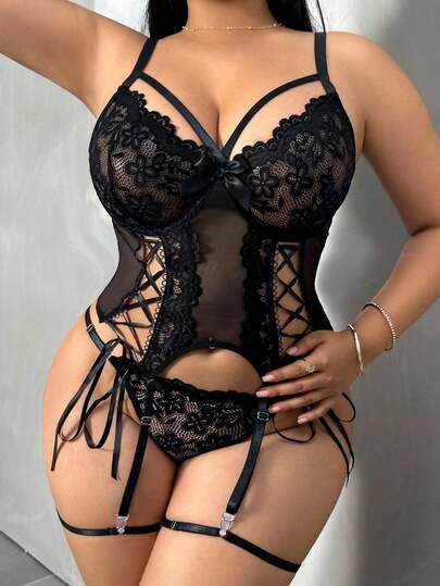 SHEIN Elegant Plus Size Black Lace Lingerie Teddy With Caged Bodice. This Alluring Piece Features A Seductive Lace-Up Corset Design, Delicate Spaghetti Straps, And Supportive Push-Up Bra Cups, Ideal For A Evening.