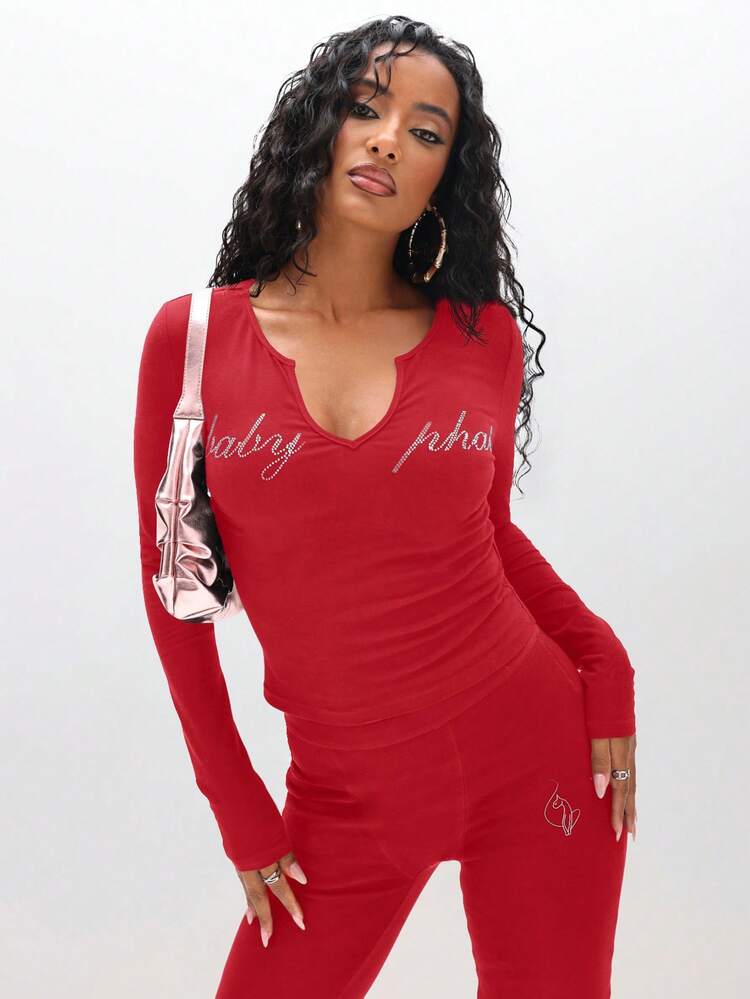 BABYPHAT Long Sleeve Notch V Neck Top With Rhinestone Text And Metallic Accent Details For Holiday Party