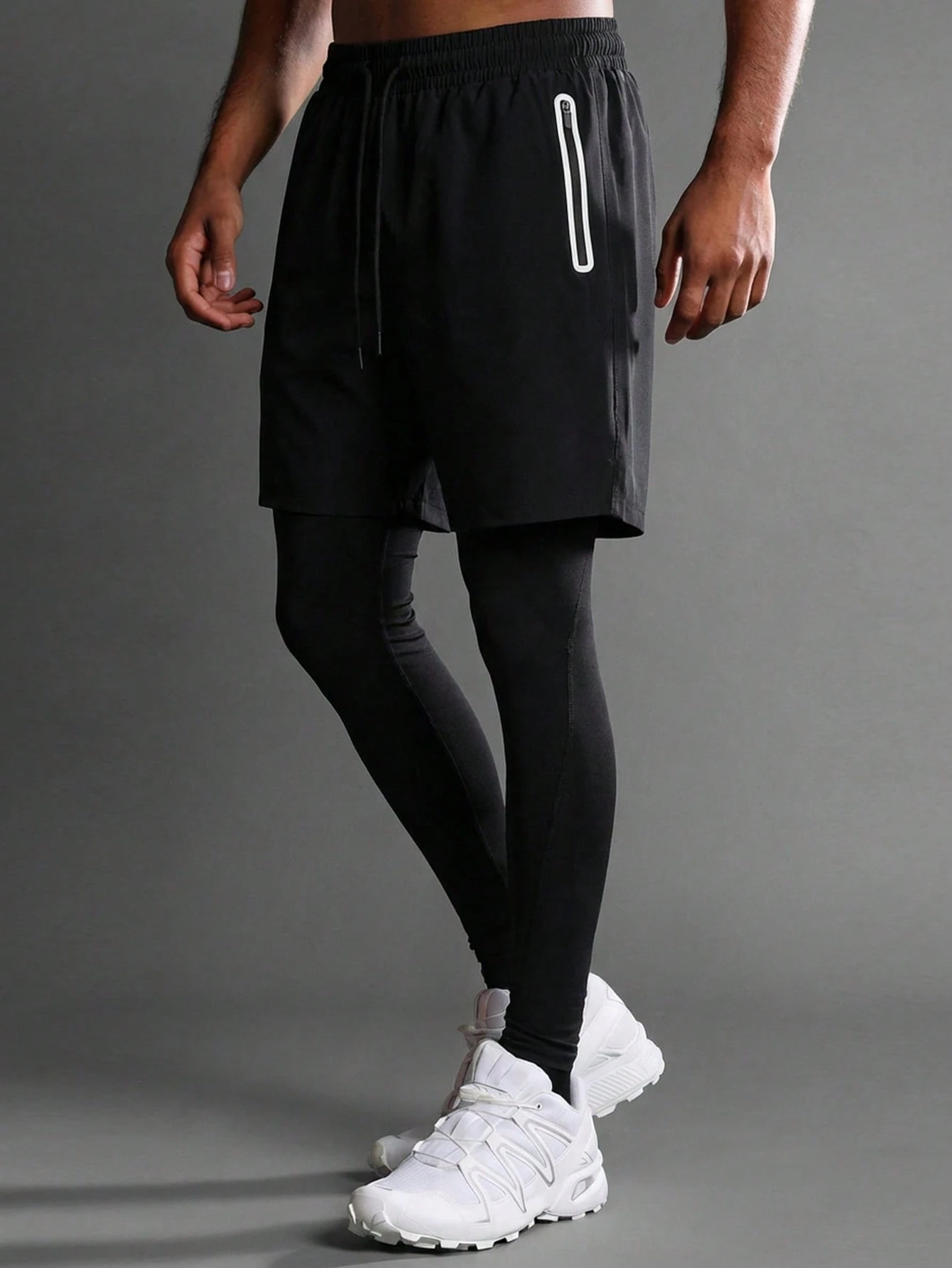 Collant a compressione con pantaloncini sportivi