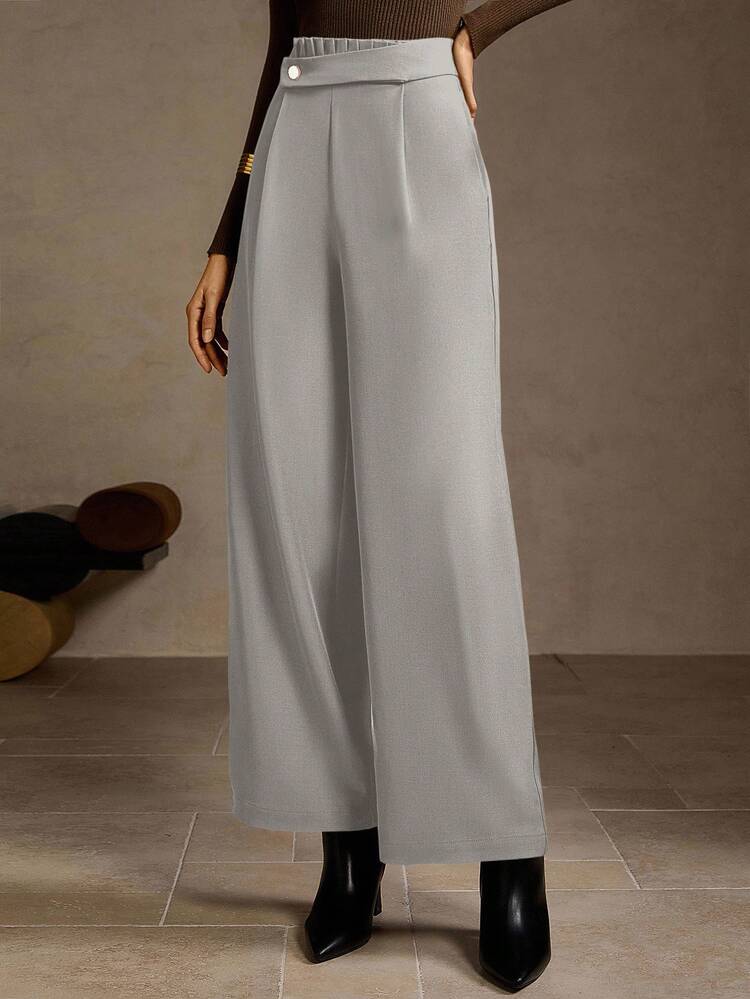 CALÇA PANTALONA DE PERNA LARGA COM PREGAS DOBRADAS