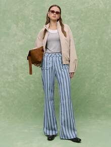 Nöista 高腰条纹阔腿裤，配有前口袋，宽松版型。舒适百搭，这款吸睛的条纹长裤可提升日常穿搭和休闲时尚造型的格调。完美契合现代日常穿着、周末造型和春季穿搭，打造轻松又不失精致的风格。 - 藍色 - 查看 4