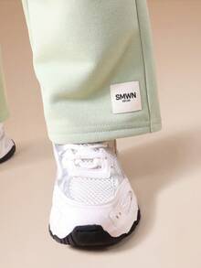 Bộ đồ thể thao SUMWON dành cho bé trai, gồm áo nỉ dài tay cổ tròn và quần jogger ống rộng, thích hợp cho cả hoạt động thường ngày và kỳ nghỉ. - Nhiều màu - Xem 6