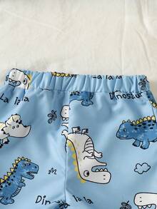 SHEIN Playful Pals Conjunto informal de camisa de manga corta y pantalones cortos con estampado de dinosaurio de dibujos animados para bebé niño - Celeste - Ver 6