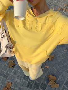 Muchica This Loose-Fitting Sweatshirt Features An Applique Letter Embroidery On The Front, A Drop-Shoulder Design, And Is Comfortable And Versatile. Suitable For Back-To-School, Autumn/Winter, Christmas, And Various Other Occasions, It's Cute, Casual, And Has, Versatile Style. A Must-Have Item For Any Capsule Wardrobe, This Creamy Yellow Christmas-Themed Sweatshirt Has A Lovely Feel. - Yellow - View 6