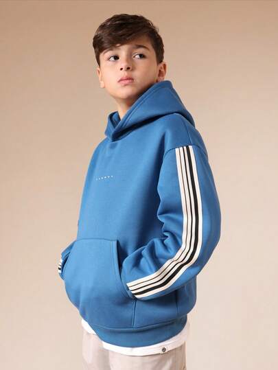  Sudadera con capucha azul para niños SUMWON con rayas laterales, manga larga, bolsillo central, sudadera casual para niños para usar en primavera, otoño e invierno, vacaciones