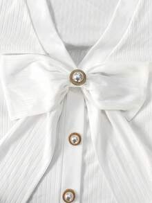 GlowEve CURVE Bộ đồ hai mảnh đen trắng dài tay dành cho nữ gồm áo khoác cardigan trắng thắt nơ và quần dài đen. - Đen và trắng - Xem 4