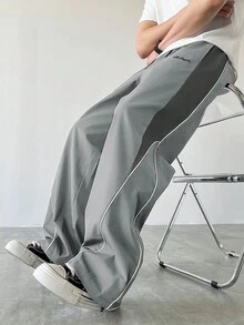 Manfinity EMRG 男士休闲撞色抽绳直筒裤，宽松长款拼接黑色直筒运动裤，男士灰色喇叭运动裤，男士喇叭裤，灰色裤子，高尔夫裤，男士阔腿侧条纹健身裤 - 淺灰色 - 查看 4