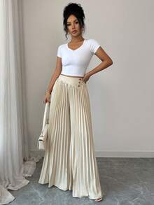 Elenzga Quần ống rộng xếp ly cài nút cạp cao thanh lịch dành cho nữ, tôn lên đường cong cơ thể và tôn lên vẻ thanh lịch tinh tế. Phù hợp với nhiều dịp khác nhau, từ trang phục công sở trang trọng và đi làm, đến trang phục gợi cảm, phong cách Pháp lãng mạn, dạo phố thường ngày, kỳ nghỉ, sự kiện theo chủ đề cổ điển Trung Đông, tiệc trà chiều ấm cúng, tiệc tùng quyến rũ, cũng như năm mới, lễ Tạ ơn, Giáng sinh, ngày lễ tình nhân và các lễ kỷ niệm khác. - Màu be - Xem 6