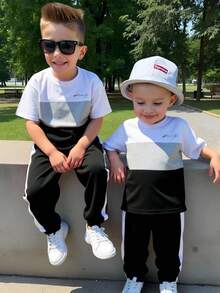 2 pièces/Set T-shirt à manches courtes et pantalon pour jeunes garçons, style décontracté et confortable, contraste noir blanc gris avec motif graphique de lettres. Convient pour le printemps, l'été et l'automne