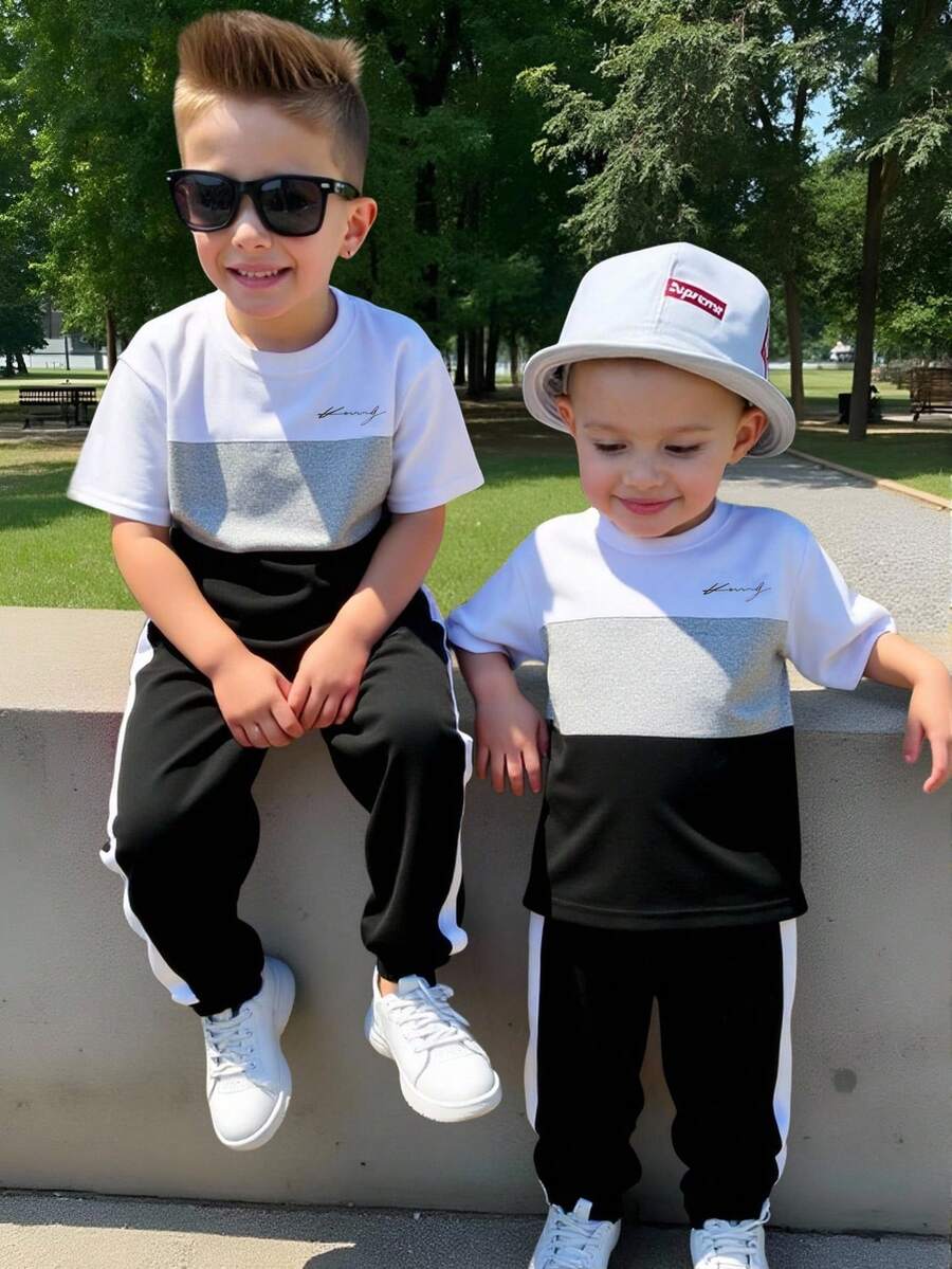 2 pièces/Set T-shirt à manches courtes et pantalon pour jeunes garçons, style décontracté et confortable, contraste noir blanc gris avec motif graphique de lettres. Convient pour le printemps, l'été et l'automne
