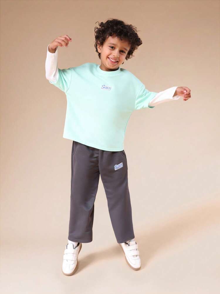 モックレイヤードTシャツとスウェットパンツのセット