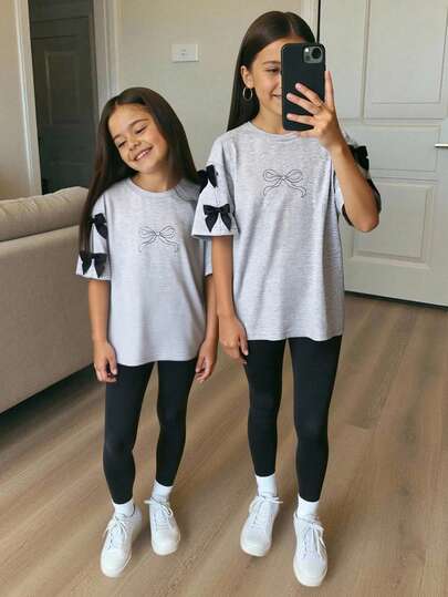 Leap Crew Löst och avslappnat set med enkel och bekväm rund halsringning och rosettdekoration för unga flickor, vårtejset med t-shirts för unga flickor, avslappnad kostym för unga flickor