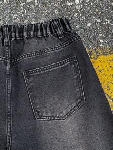 Shorts en jean noirs amples, confortables et simples, style décontracté vintage cool Y2K pour ados. Vêtements de base pour garçons ados, idéaux pour la rentrée scolaire, le collège, les sorties, les festivals et la plage. Tenues streetwear pour l'automne, l'hiver et la rentrée scolaire.