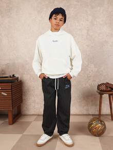 SUMWON Classic Youth Pullover Hoodie Casual Everyday Basic Sweatshirt With Front Logo Campus Style Cozy Winter Layering Essential Drawstring Streetwear - White - View 3