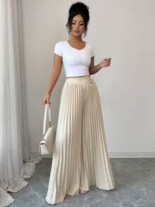 Elenzga Quần ống rộng xếp ly cài nút cạp cao thanh lịch dành cho nữ, tôn lên đường cong cơ thể và tôn lên vẻ thanh lịch tinh tế. Phù hợp với nhiều dịp khác nhau, từ trang phục công sở trang trọng và đi làm, đến trang phục gợi cảm, phong cách Pháp lãng mạn, dạo phố thường ngày, kỳ nghỉ, sự kiện theo chủ đề cổ điển Trung Đông, tiệc trà chiều ấm cúng, tiệc tùng quyến rũ, cũng như năm mới, lễ Tạ ơn, Giáng sinh, ngày lễ tình nhân và các lễ kỷ niệm khác. - Màu be - Xem 5