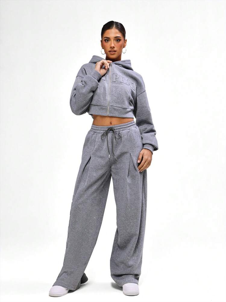BABYPHAT Sweat-shirt-shirt zippé court avec détail de texte gaufré. Sweat-shirt-shirt en jersey gris pailleté. Pull oversize décontracté pour l'hiver et l'automne