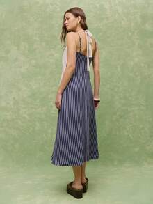 Nöista Striped Midi Dress In Navy  White With A With Front Knot.  Perfect For Spring Summer Outfits Casual Chic Styling  Effortless Everyday Formal Event Weeding Guest Pool Party Festival.  Vacation Luxury Going Out  Wedding  Party    Festival  Holiday  Summer - Navy Blue - View 2