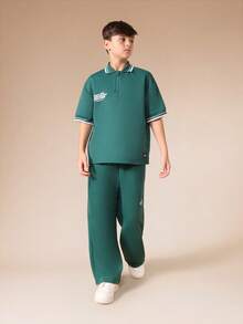 SUMWON Setelan Polo Oversize Track Star Champions Homecoming dengan Celana Panjang Lebar dan Detail Garis Kontras, Pakaian Kasual Serasi dengan Resleting dan Kerah Seperempat. - Dark Green - View 8