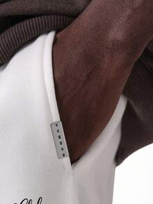 Quần thể thao ống rộng thoải mái cao cấp SUMWON có túi, thuộc bộ sưu tập Signature, thích hợp cho mùa đông, mang đến sự thoải mái tối đa. - trắng - Xem 4