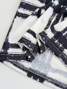 SHEIN Essnce Conjunto de dos piezas de mujer talla grande de moda casual de otoño/invierno, cómodo y suelto, básico y versátil, estilizante, con blusa de manga larga negra y pantalones anchos a cuadros, ropa de primavera, estilo sencillo - Blanco y Negro - Ver 6