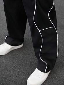 Manfinity CasualCool 男士休闲畅销直筒裤，INS 高街嘻哈风格，侧边白色抽绳，黑色面料，适合所有季节和日常穿着，送给男友/老公的必备礼物，男士休闲服装，Y2K 男士慢跑裤，男士阔腿侧条纹健身裤，男士运动裤，男士休闲裤，男士健身裤 - 黑色 - 查看 5