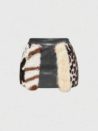 Falda mini de cintura baja de piel sintética con estampado animal y parches en estilo hippie vintage "Millennium Babe" para mujeres