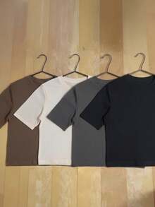 Paquete 4 Camisetas Estilo Boxy Fit Básica sin estampado de algodón, ideal para la calle, combinar estilos o regalar - Negro,Blanco, Moca y Gris Carbón - Ver 15